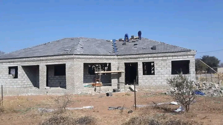New residential build with roof installation in progress