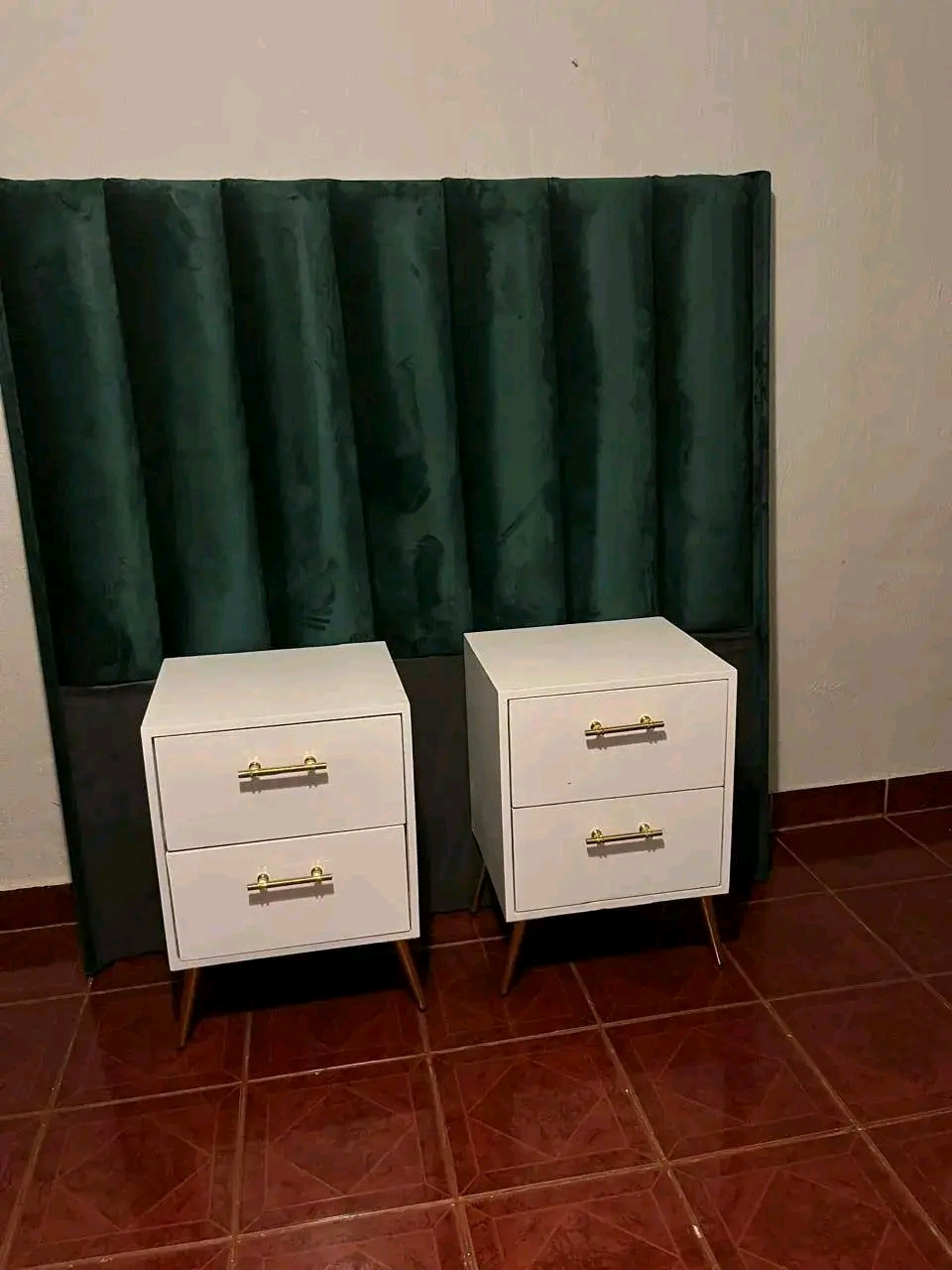 Pair of bespoke white bedside cabinets with brass handles